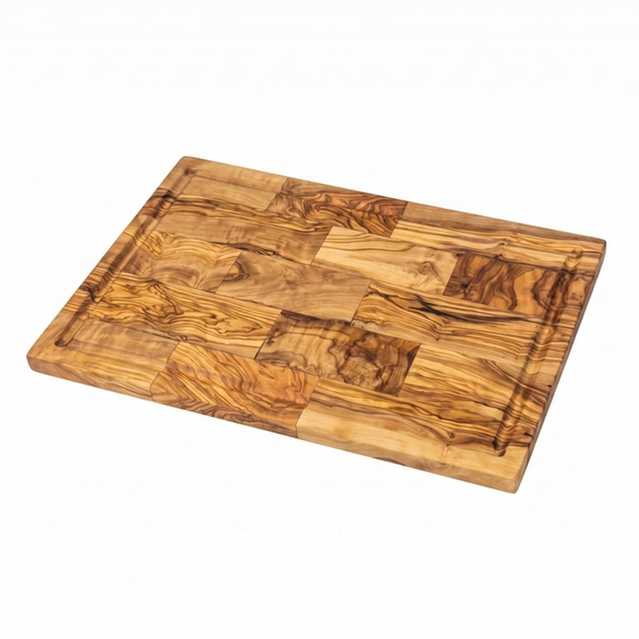 Olive wood cutting and serving board showing its patchwork grain