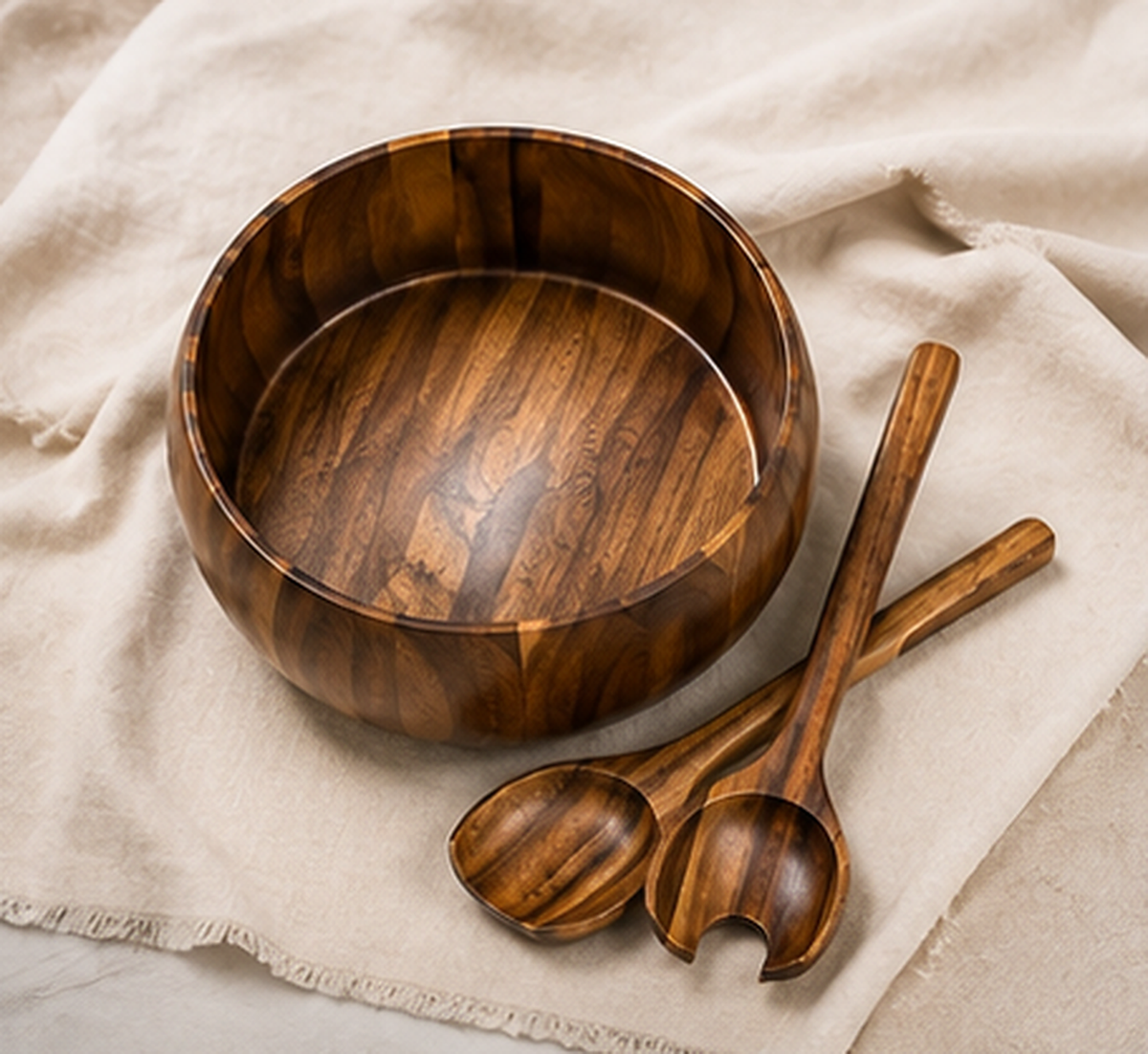 Acacia salad bowl with its two matching servers
