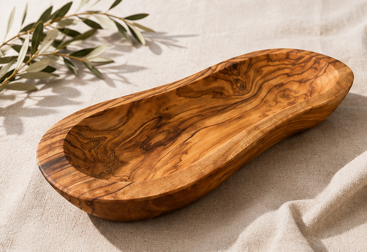 Live edge olive wood bowl showing the grain and color variation of Mediterranean olive wood